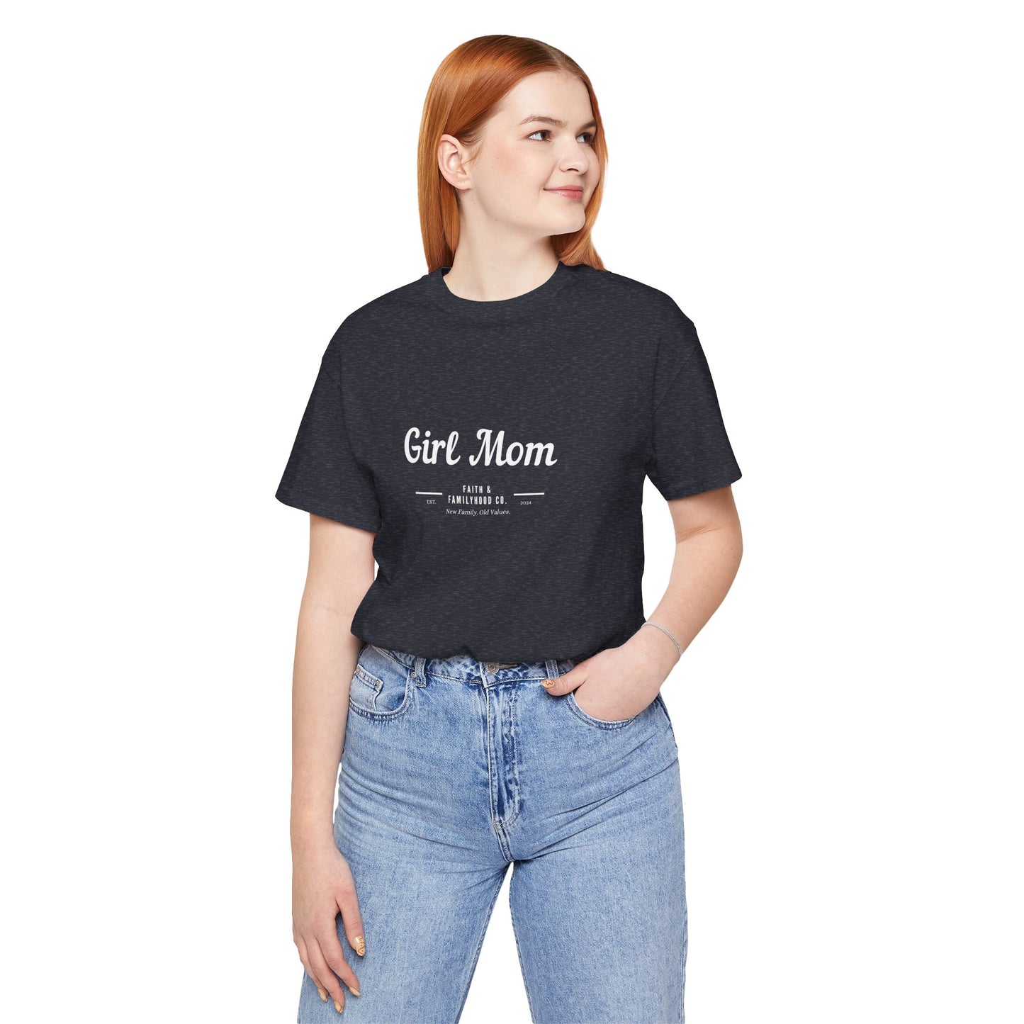 A close-up of a dark gray heather t-shirt with the phrase "Girl Mom" printed in a vintage-style font, emphasizing the high-quality construction of this Mom Shirts collection.