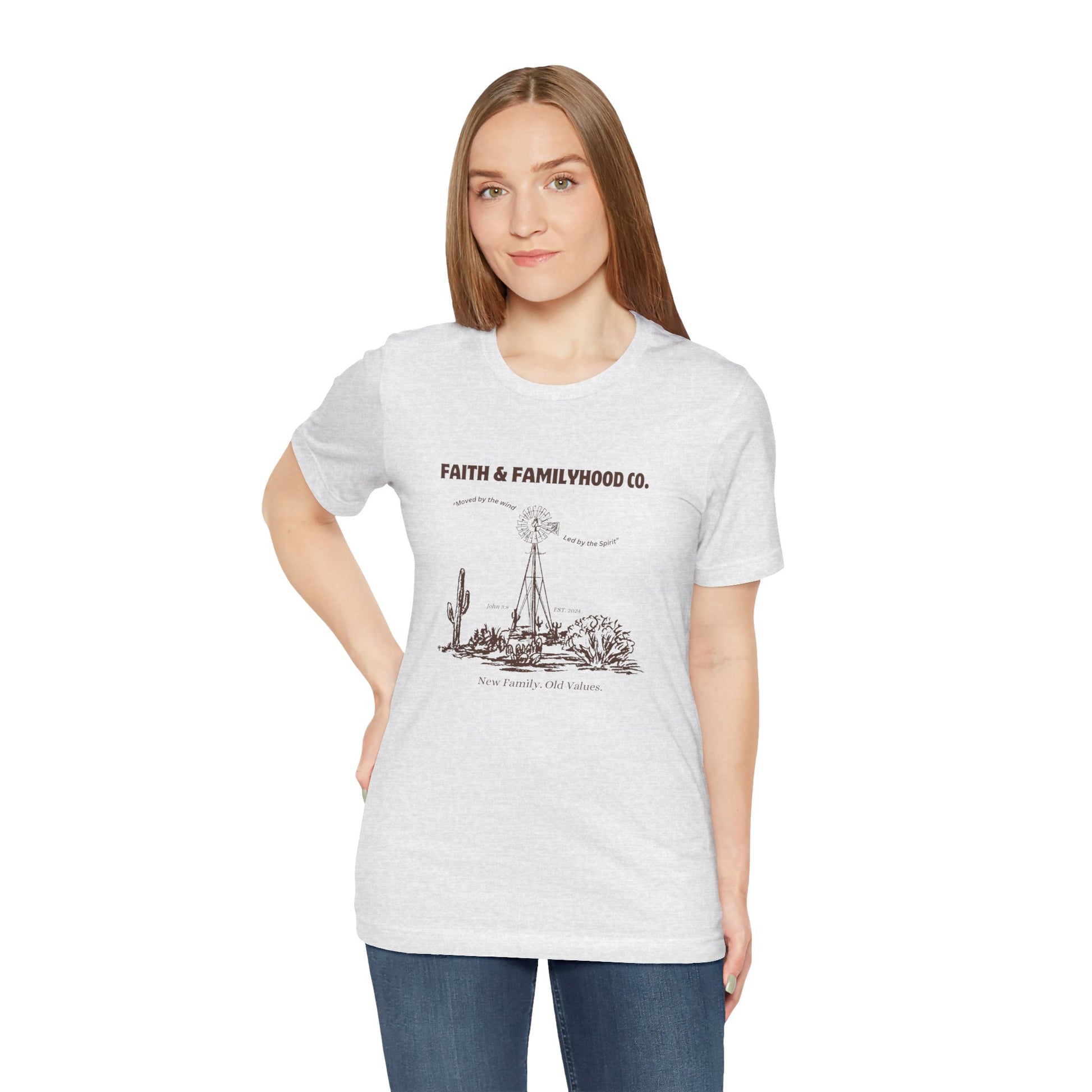 A vintage t-shirt with a faded graphic of a classic Western movie scene, printed in a weathered, worn style, evoking the nostalgia of a bygone era with its slightly faded colors and cracked graphic.