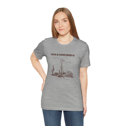 A vintage t-shirt with a faded graphic of a classic Western movie scene, capturing the nostalgia of a bygone era.